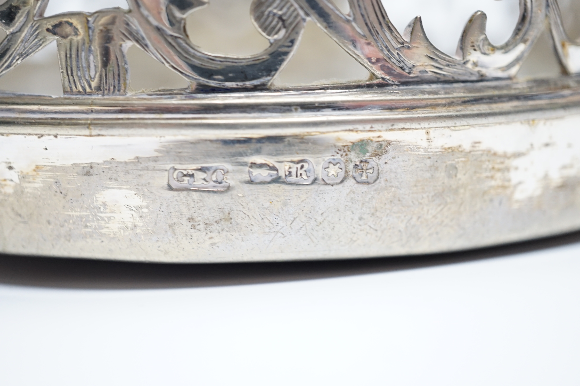 A George V silver cigarette case, 82mm, a similar silver mounted cigarette box, a modern silver mounted small wine coaster and three silver plated wine coasters including a pair.